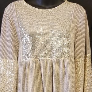 Babydoll style top with  lots of bling